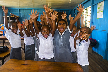 Very happy school children in a school, Yanuya island, Mamanuca islands, Fiji, South Pacific, Pacific