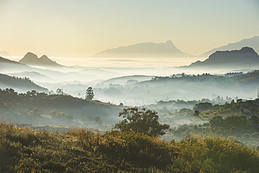 Sunrise and fog over the mountains surrounding Blantyre, Malawi, Africa