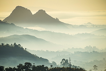 Sunrise and fog over the mountains surrounding Blantyre, Malawi, Africa