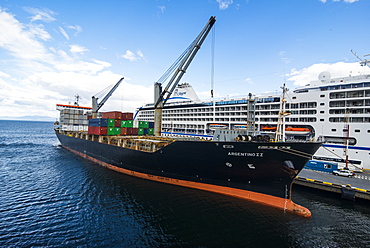 Cargo ship anchoring in the harbour of Ushuaia, Tierra del Fuego, Argentina, South America