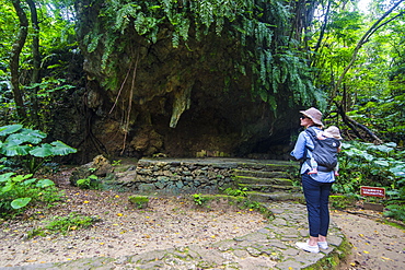 Woman with a baby hiking in the Sacred site of Sefa Utaki, UNESCO World Heritage Site, Okinawa, Japan, Asia