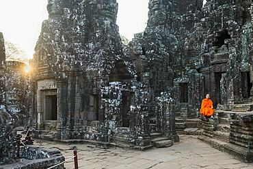 Monk sitting sitting in the Bayon temple, UNESCO World Heritage Site, Angkor, Siem Reap, Cambodia, Indochina, Southeast Asia, Asia