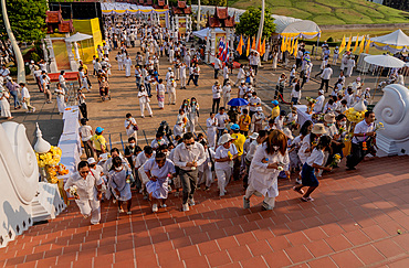 Devotees attending the Makha Bucha Buddhist celebrations where relics of Buddha are enshrined at the Royal Park Rajapruek, Chiang Mai, Thailand, Southeast Asia, Asia