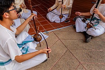 Thai classical musicians at Makha Bucha Buddhist celebrations where relics of Buddha are enshrined at the Royal Park Rajapruek, Chiang Mai, Thailand, Southeast Asia, Asia