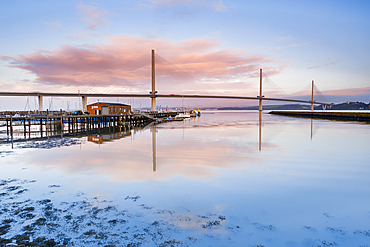 The Queensferry Crossing at sunrise, view from the Fírth of Forth at South Queensferry, near Edinburgh, Scotland, United Kingdom, Europe