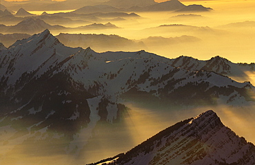 Mountains, switzerland. View from mt. Saentis; mt. Stoss, swiss alps. Morning light/snow/winter. Saentis, appenzell, eastern part of switzerland