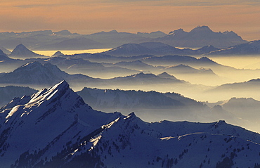 Mountains, switzerland. View from mt. Saentis; mt. Stoss, swiss alps.Evening Light/snow/winter. Saentis, appenzell, eastern part of switzerland. this image is blocked for any calendar use for the year 2006.