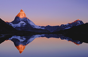 Matterhorn, switzerland. Valais, wallis. Alps, matterhorn at 4478 m. Reflection in lake riffel at dawn