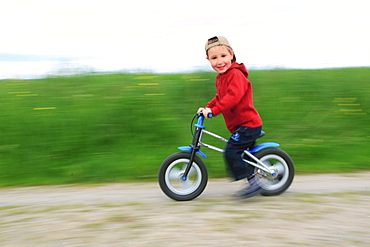 Riding bicycle,like a bike, in spring, gossau zh, zuerich, switzerlan