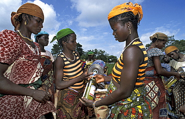 Benin women at crs distribution after a mother/ clinic hangar village, bembereke