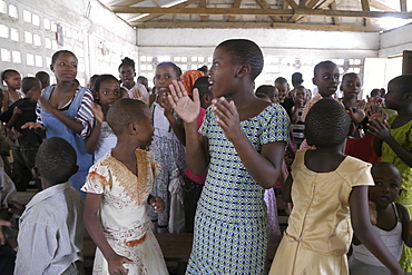 TANZANIA The Roman Catholic Parish of Buza, Dar es Salaam. Sunday mass. Activity for children. photograph by Sean Sprague