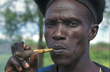 South sudan toposa man smoking a, narus