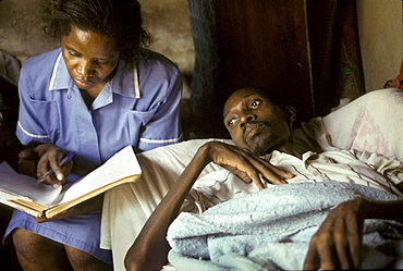 Uganda patient being cared for by mobile nurse nsambye hospital, kampala