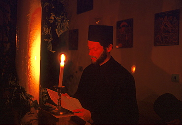 Ukraine greco-catholic at st. Theodores monastery reading a prayer during matins ternopil