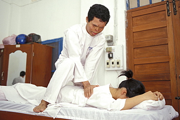 Cambodia masseur (who had blinded by a robber throwing in his ) at at the seeing hands therapeutic massage. Phnom