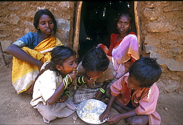 India - slavery children of bonded laborers eating, tamil