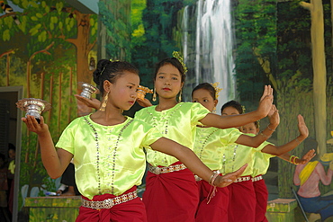 Cambodia community forestry project at chambok, kampong speu. Girls dancing.