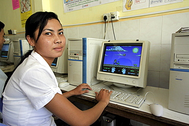 Cambodia computer students at vocational training course run by caritas, phnom penh.