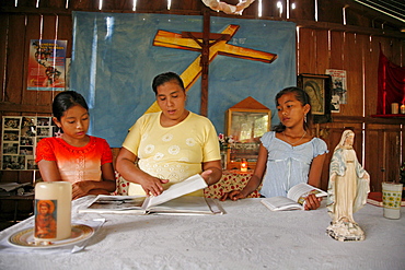 Guatemala santa rita village of returnees, in peten. community fled guatemala during violence of 1980s in times of peace have returned to settle in jungle lowlands. Liturgy of word celebrated at a small catholic chapel in village