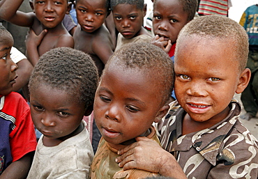 Namibia a feeding centre hungry children in rundu. Most of these children aids orphans, or positive themselves, or both. A catholic church organization provides them with a daily meal, perhaps only decent food they. hunger is evident in their eyes expressions