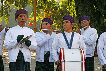 Myanmar musicians at catholic wedding of tribal kachins at myitkyina, a largely kachin community in north burma near chinese border 