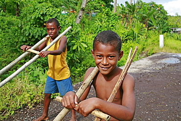 Fiji boys playing with their cars, taveuni photo by sean sprague