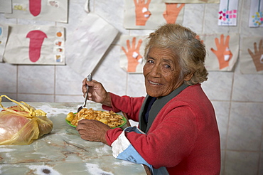 Bolivia. Poor woman at a feeding center, cochabamba