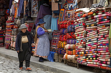 Bolivia. Shop selling ponchos and other weavings, of la paz. 2007   