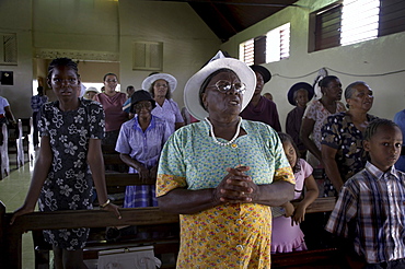 Jamaica. Congregation during sunday mass in the catholic church at seaford town