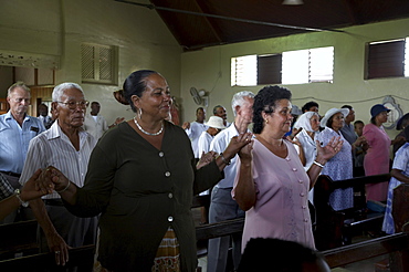 Jamaica. Congregation during sunday mass in the catholic church at seaford town