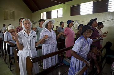 Jamaica. Congregation during sunday mass in the catholic church at seaford town