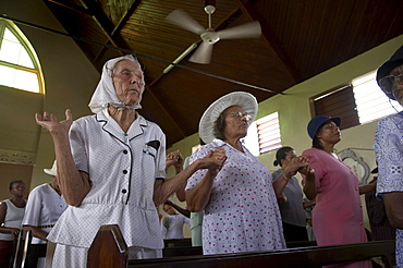 Jamaica. Congregation during sunday mass in the catholic church at seaford town