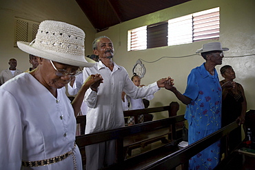 Jamaica. Congregation during sunday mass in the catholic church at seaford town