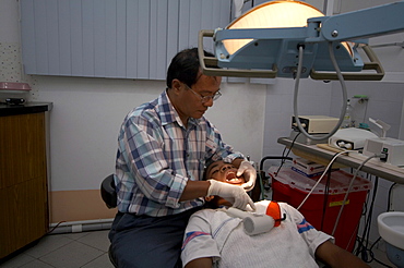 Jamaica. Dentist at work in clinic at montego bay