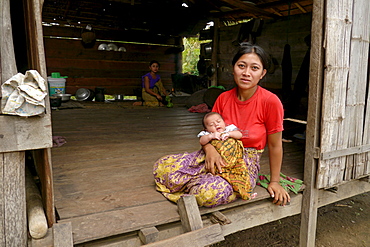 CAMBODIA Lib Kham (23) with her newborn baby, Ban Bung village, Stung Treng district