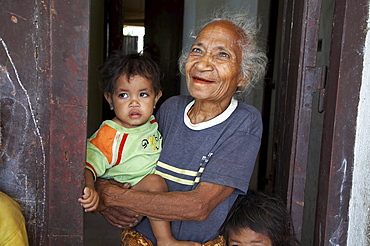 East timor. Camp for internally displaced people (idps) in the old hospital at baucau. Jacinta marques, and old woman and children at the camp