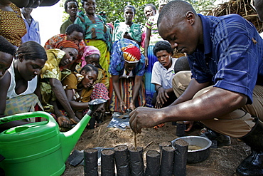 Uganda tree nursery project in kisoga run by caritas lugazi, kayunga district. preparing plastic pots for planting tree seeds