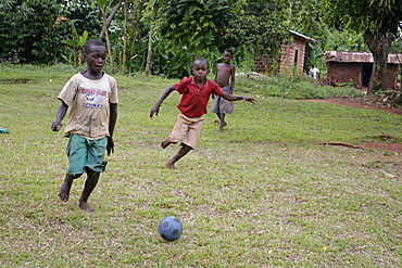 Uganda boys playing footbal, kayunga district