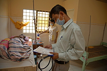 Cambodia seedlings of hope hospice for aids patients, phnom penh. dr. phan phearath, employed by maryknoll, visiting patients