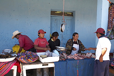 Guatemala local maket at lemoa, el quiche. butchers stall