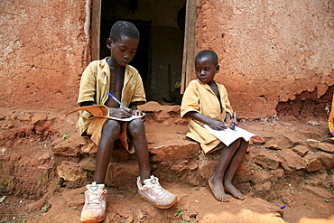 Burundi boys doing their homework after school, gitera.