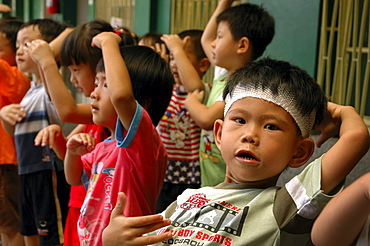 Education, taiwan. A school for children with special needs, tainan. Children at the school acting a play