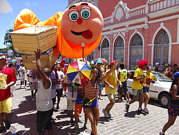 Brazil carnival procession. Crowd of revellers in the street during carnaval of olinda, pernambuco