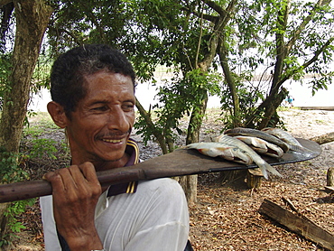 Colombia heny abufe, fisherman, with a small catch from the rio magdalena, barrancabermeja