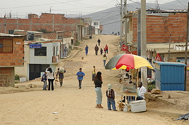 Colombia street scene in the sprawling slum development at altos de cazuca, bogota