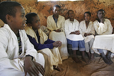 Ethiopia boys chanting geez prayers. Mihur eyesus orthodox monastery, gurage