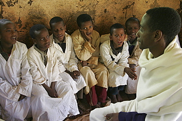 Ethiopia boys chanting geez prayers. Mihur eyesus orthodox monastery, gurage