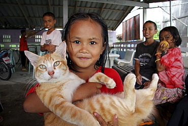 Thailand girl with cat. Pattani