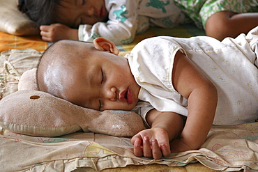 Thailand infants sleeping at day care center in chiang dao village, near chiang mai