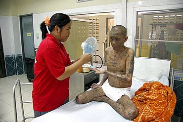 Thailand hiv+ patients in an aids hospice at a buddhist temple in lopburi